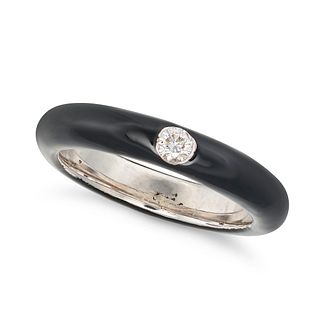 A BLACK ENAMEL AND DIAMOND BAND RING in 18ct white gold, the band decorated all the way around wi...