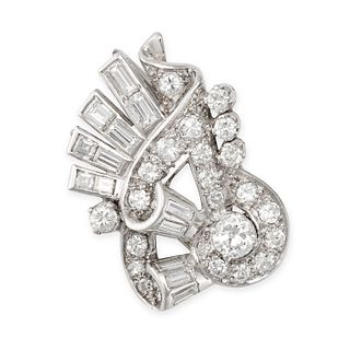 NO RESERVE - A VINTAGE DIAMOND CLIP BROOCH in scrolling design, set throughout with round brillia...