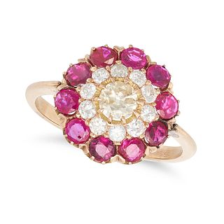 A RUBY AND DIAMOND CLUSTER RING in yellow gold, set with an old European cut diamond of approxima...