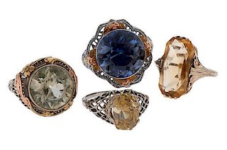 Collection of Four Gold Rings with Various Stones 