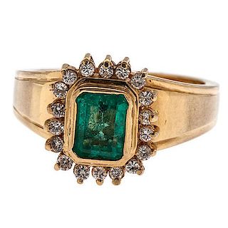Ring with an Emerald and Diamonds in 18 Karat 