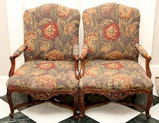 CARVED WALNUT & FLORAL UPHOLSTERED OPEN ARM CHAIRS
