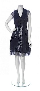 A Chanel Navy Sequin and Taffeta Skirt Ensemble, Size 42.