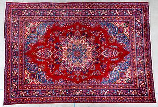 A Persian Room Size Rug