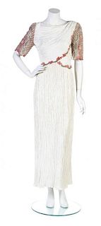 * A Mary McFadden Couture Ivory Pleated Gown, Size 6.