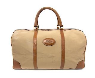 A Celine Khaki Canvas Travel Bag, 19 x 11 1/2 x 9 inches.