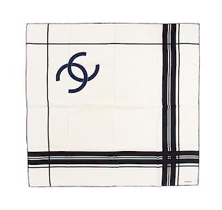 * A Chanel Navy and Ivory Silk Scarf, 33 1/2 x 33 1/2 inches.