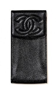 A Chanel Black Caviar Leather Sunglass Pouch, 6 1/2 x 3 x 1/2 inches.