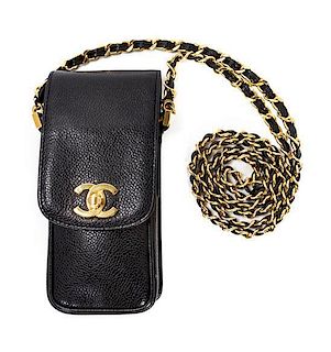 A Chanel Black Caviar Leather Pouch, 7 x 3 x 1 1/2 inches.