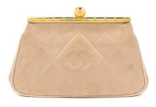 A Chanel Ballet Pink Quilted Leather Clutch, 8 x 4 1/2 x 1 1/2 inches.