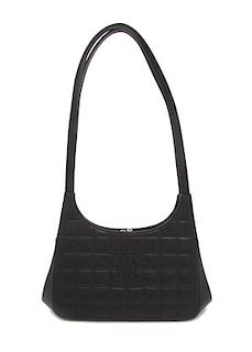 A Chanel Black Quilted Leather Bag, 9 x 6 x 3 1/2 inches.