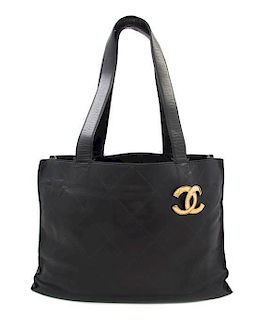 A Chanel Black Embossed Quilted Leather Tote, 16 x 12 x 5 inches.