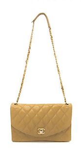 A Chanel Tan Quilted Leather Flap Bag, 9 1/2 x 7 1/2 x 1 inches.