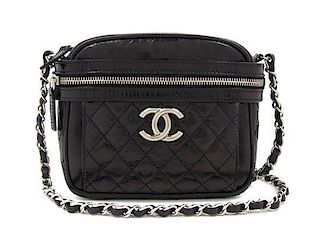 A Chanel Black Distressed Leather Portobello Mini Bag, 7 1/2 x 6 x 2 1/2 inches.
