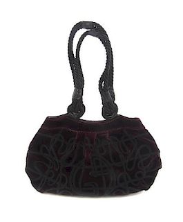 A Giorgio Armani Burgundy Velvet Evening Bag, 11 x 7 x 2 inches.