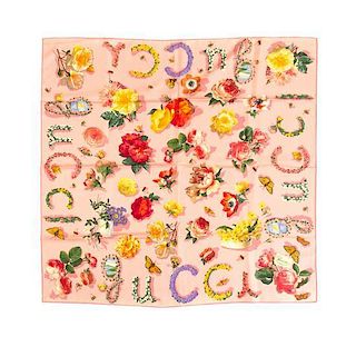 * A Gucci Pink Silk Scarf, 34 x 33 1/2 inches.
