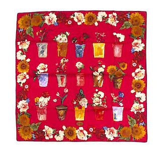 * A Gucci Red Silk Scarf, 34 x 33 1/2 inches.