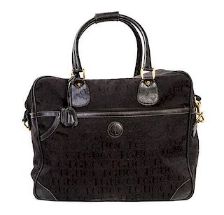 A Group of Gucci Black Monogram Luggage,
