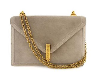 An Hermes Taupe Suede Alcazar Bag, 8 1/2 x 6 x 1 inches.