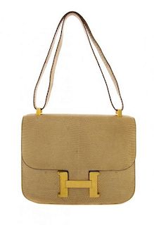 An Hermes 23cm Gold Lizardskin Constance Bag, 9 x 7 x 2 inches.