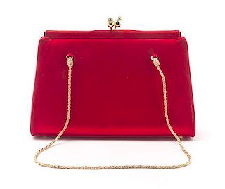A Judith Leiber Red Satin Bag, 7 1/2 x 4 1/2 x 2 1/2 inches.