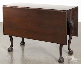 Pennsylvania Chippendale walnut drop leaf dining table, ca. 1770, with ball and claw feet