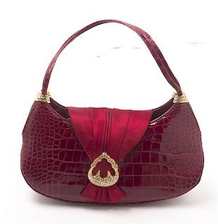 A Judith Leiber Red Alligator Bag, 7 1/2 x 4 1/2 x 3 inches.