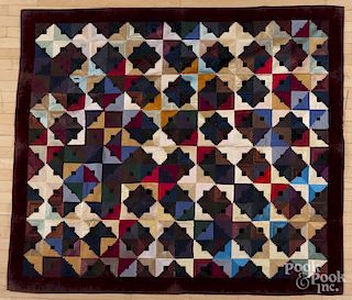 Silk courthouse steps quilt, dated 1887, 73'' x 65''.