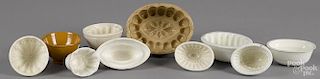 Ten assorted food molds, to include a melon, wedding cake, etc. largest - 2 3/4'' h., 5 1/2'' w.