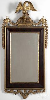 Empire mahogany and giltwood mirror, mid 19th c., with an eagle crest, 63'' h.