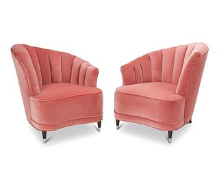 A pair of Art Deco-style lounge chairs