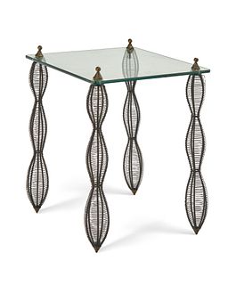 A Michael Aram cage metal and glass cocktail table