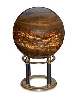 A tiger's eye polished sphere with stand