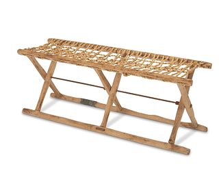 A Van Thiel & Co. wood and woven rope folding bench