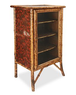 A Victorian tiger bamboo cabinet