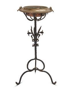 A Spanish Colonial Revival wrought iron and brass plant stand