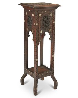 A North African carved wood stand