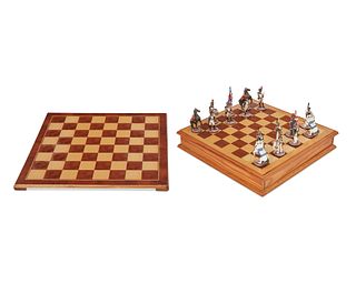 A lead figural chess set with wood board