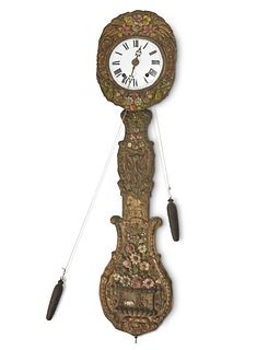 A French morbier wall clock