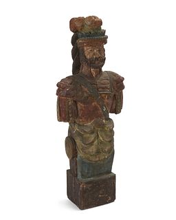 A carved and polychromed wood figure