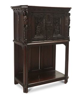 A Continental Gothic-style oak sideboard