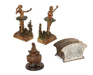 A group of decorative desk items
