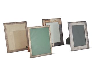 A group of silver picture frames