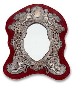 A Continental silver mirror