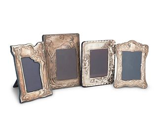 A group of Art Nouveau-style silver picture frames