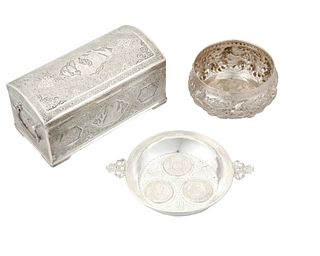 A collection of silver tabletop items
