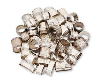 A group of silver napkin rings