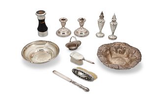 A group of sterling silver table items