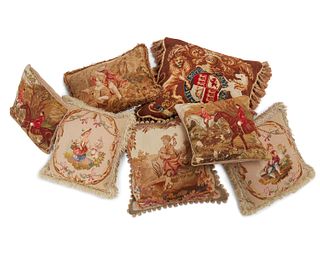 A group of tapestry and petit point throw pillows