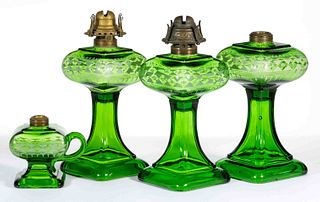 PRESSED STYLIZED-DECORATED GLASS KEROSENE LAMPS, LOT OF FOUR